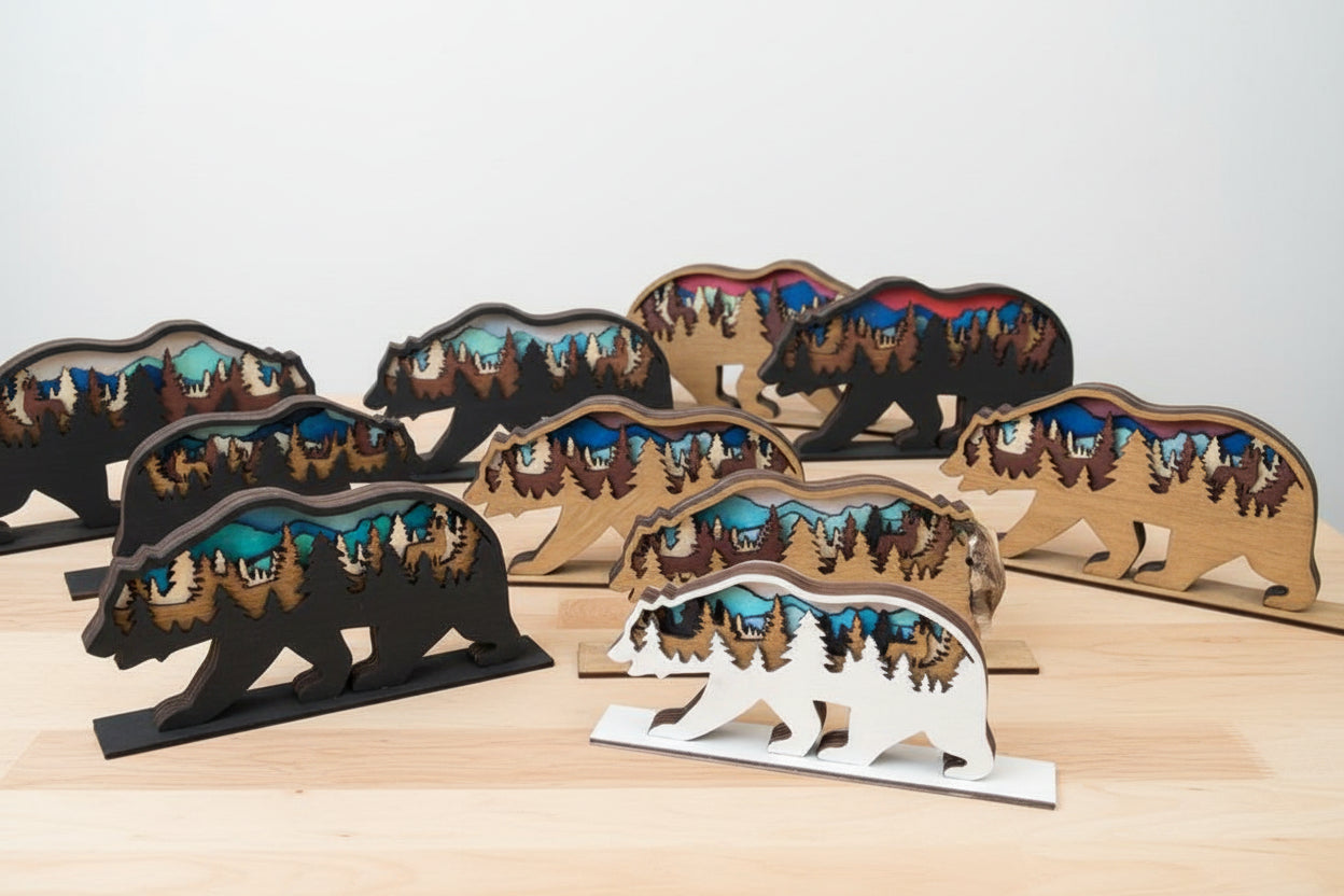 Set of bear-shaped wooden stands with scenic designs