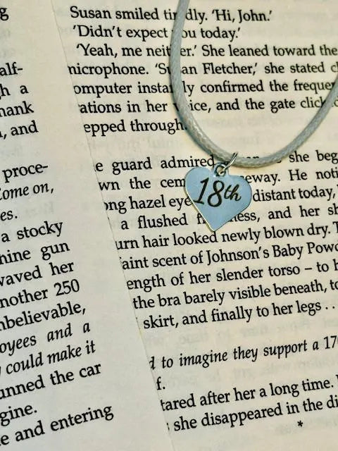 Heart-shaped pendant necklace with '18th' on