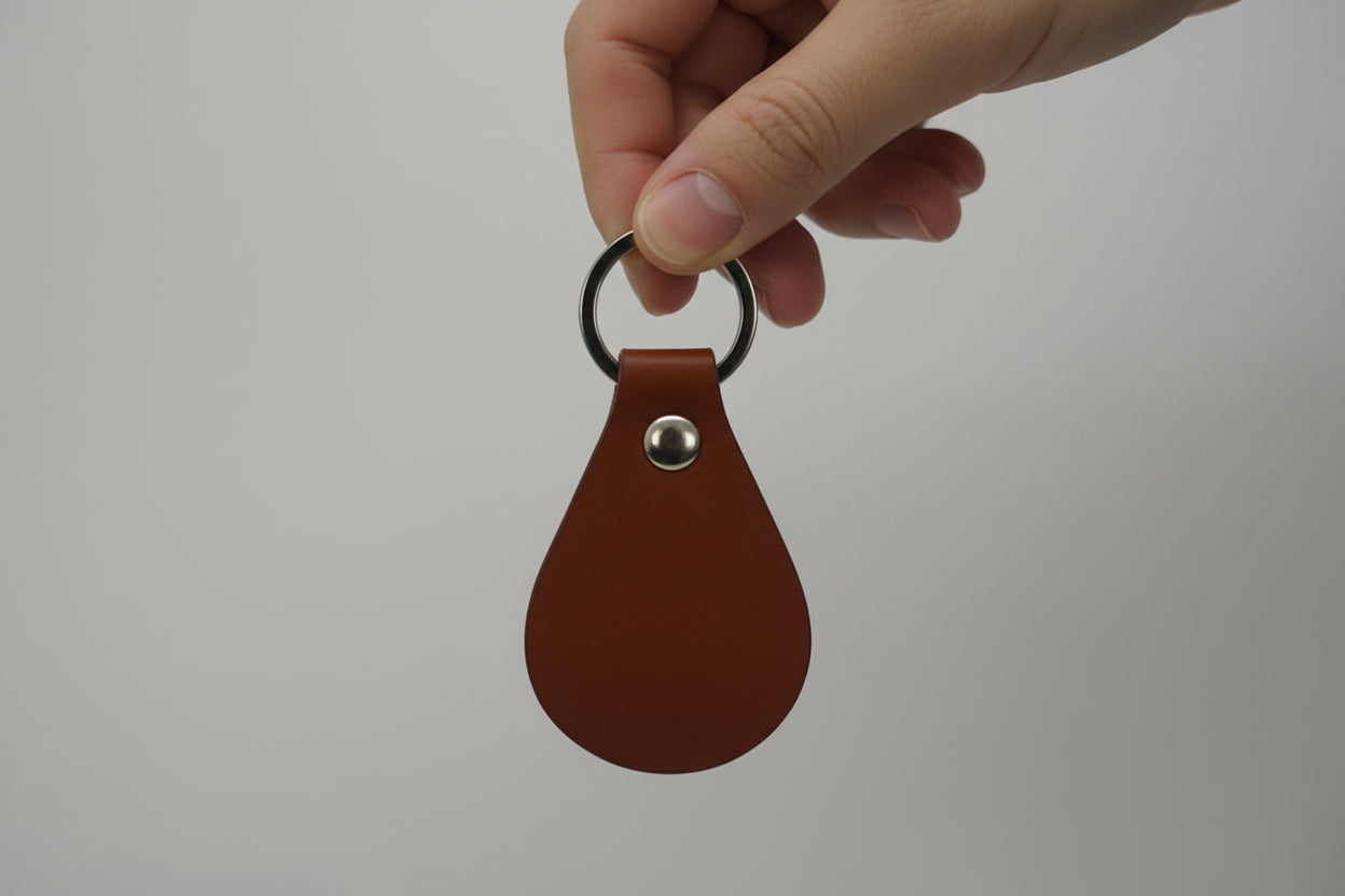 Brown blank leather keychain with metal ring on